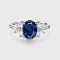 Oval cut Sapphire Cluster Engagement ring