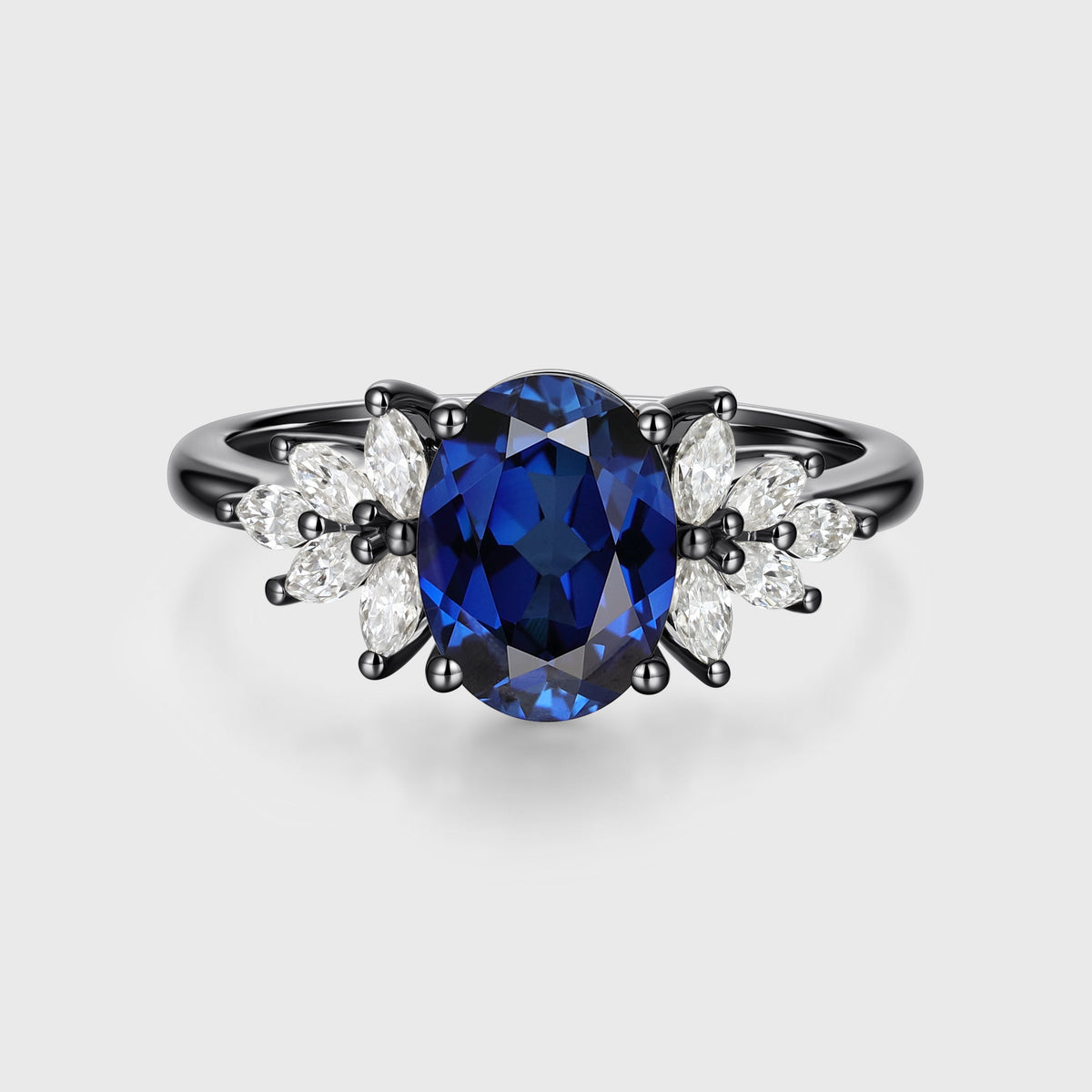 Oval cut Sapphire Cluster Engagement ring