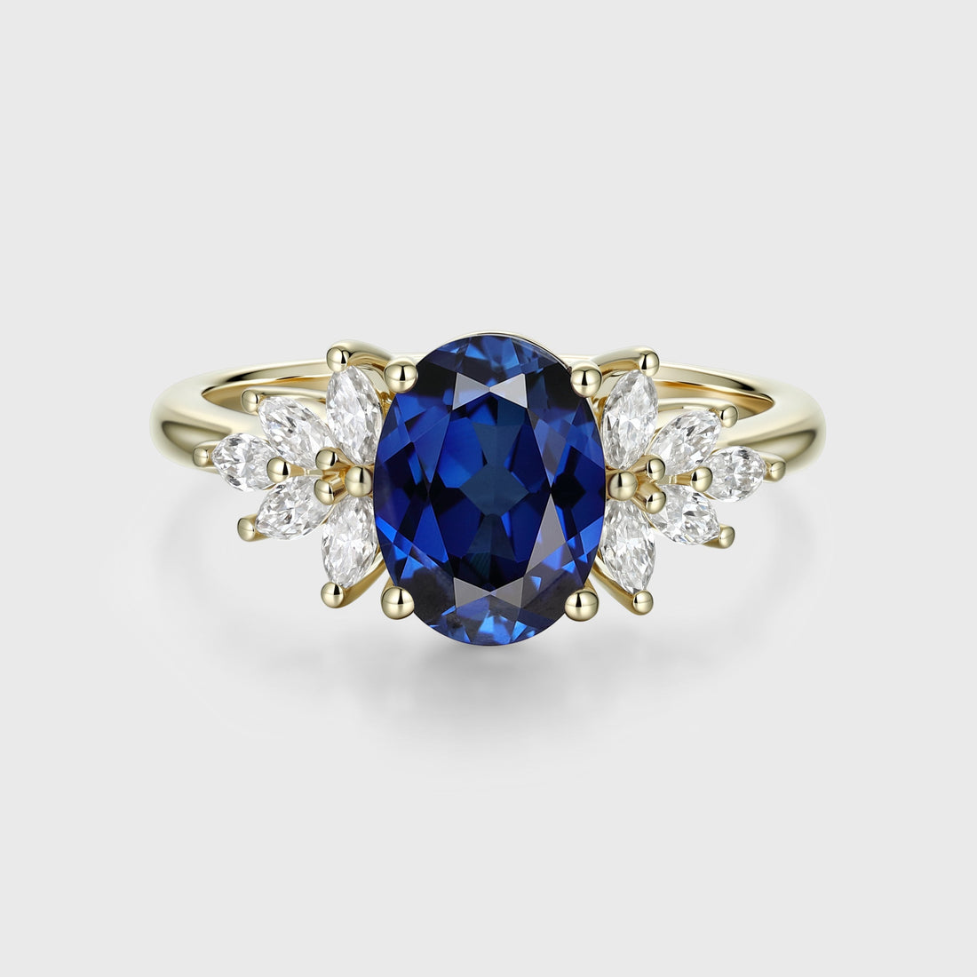 Oval cut Sapphire Cluster Engagement ring