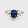 Oval cut Sapphire Cluster Engagement ring