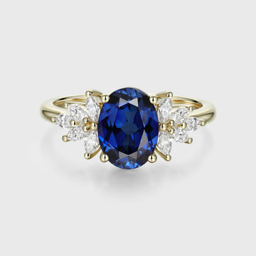 Oval cut Sapphire Cluster Engagement ring