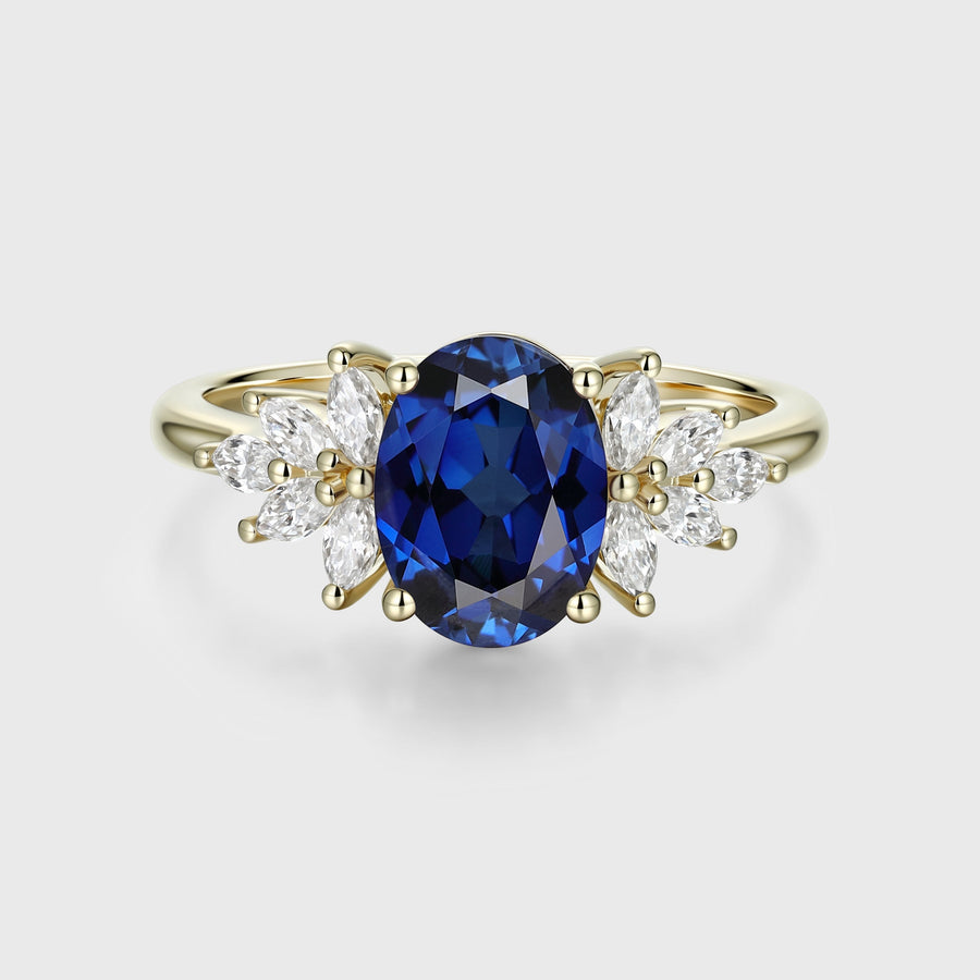 Oval cut Sapphire Cluster Engagement ring