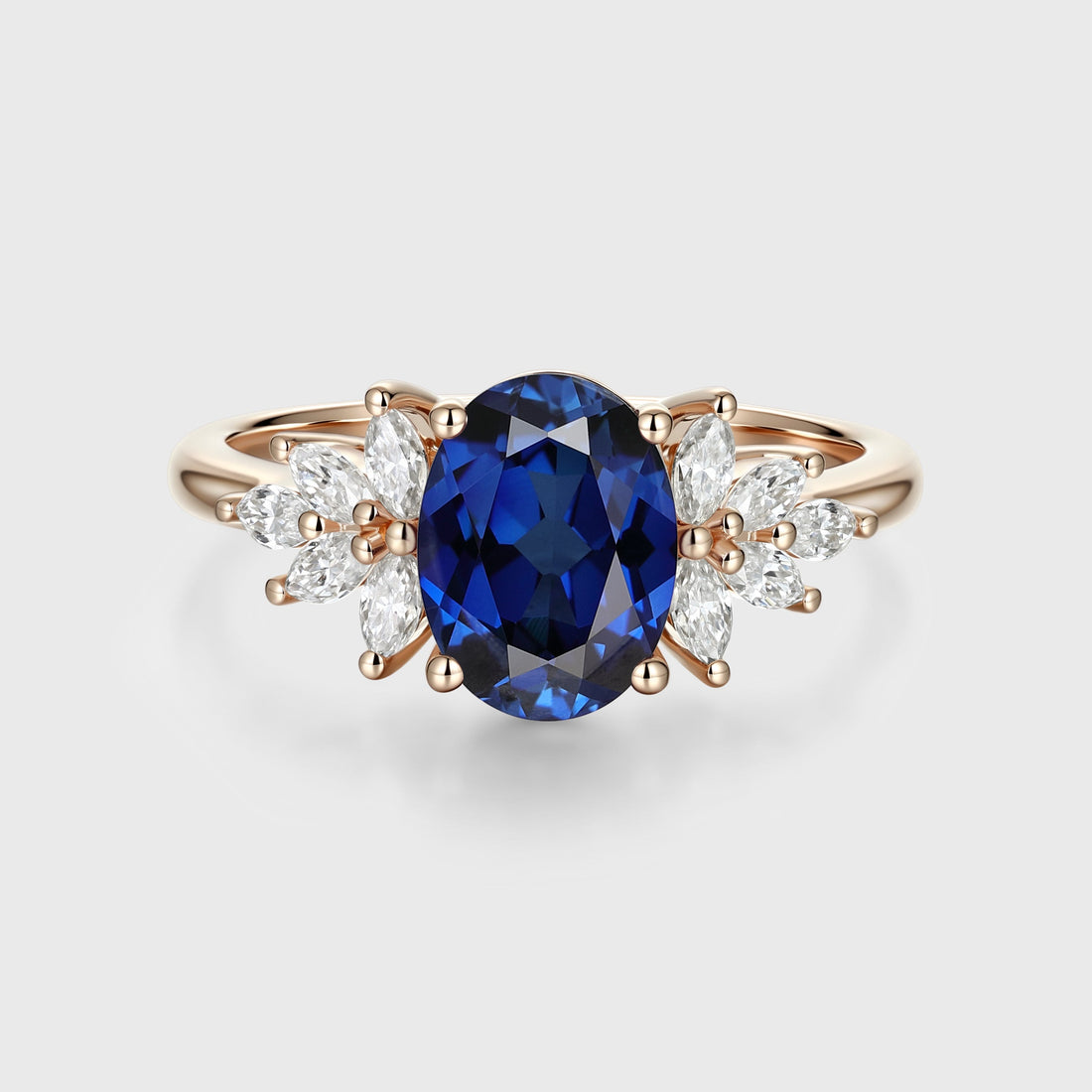 Oval cut Sapphire Cluster Engagement ring