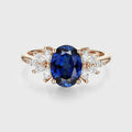 Oval cut Sapphire Cluster Engagement ring