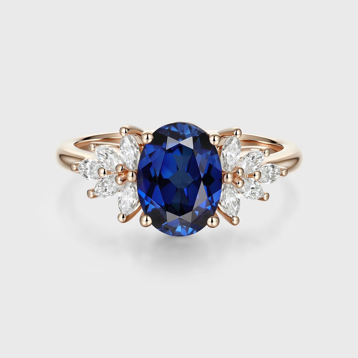 Oval cut Sapphire Cluster Engagement ring