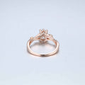 Nature Inspired Pear cut Moissanite Leaf Gold Engagement Ring