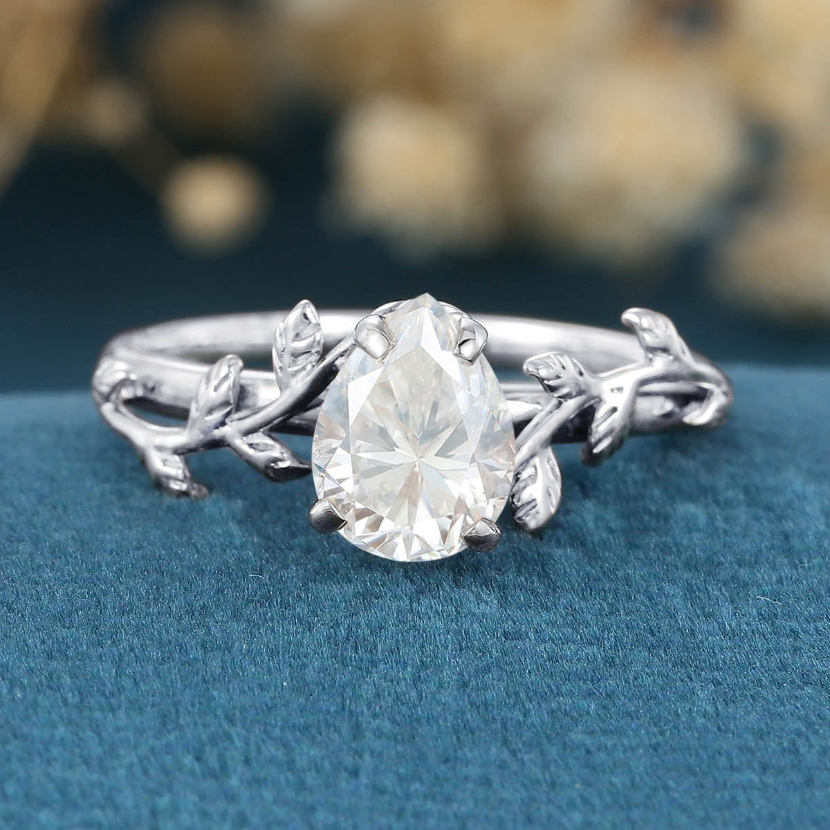 Nature Inspired Pear cut Moissanite Leaf Gold Engagement Ring