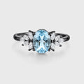 Oval cut Aquamarine Cluster Engagement ring