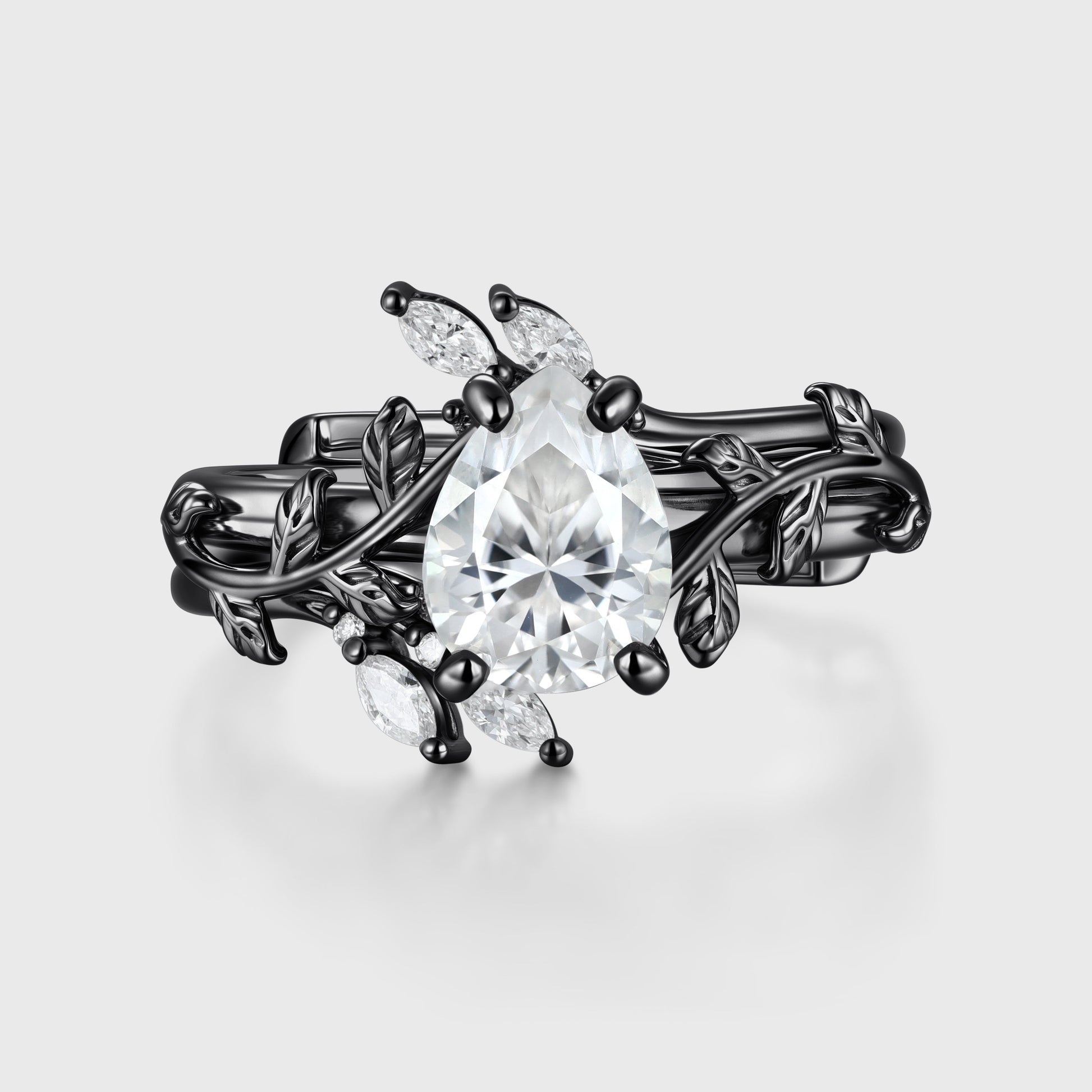 Nature Inspired Pear cut Moissanite Leaf Gold ring set