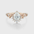Nature Inspired Pear cut Moissanite Leaf Gold Engagement Ring