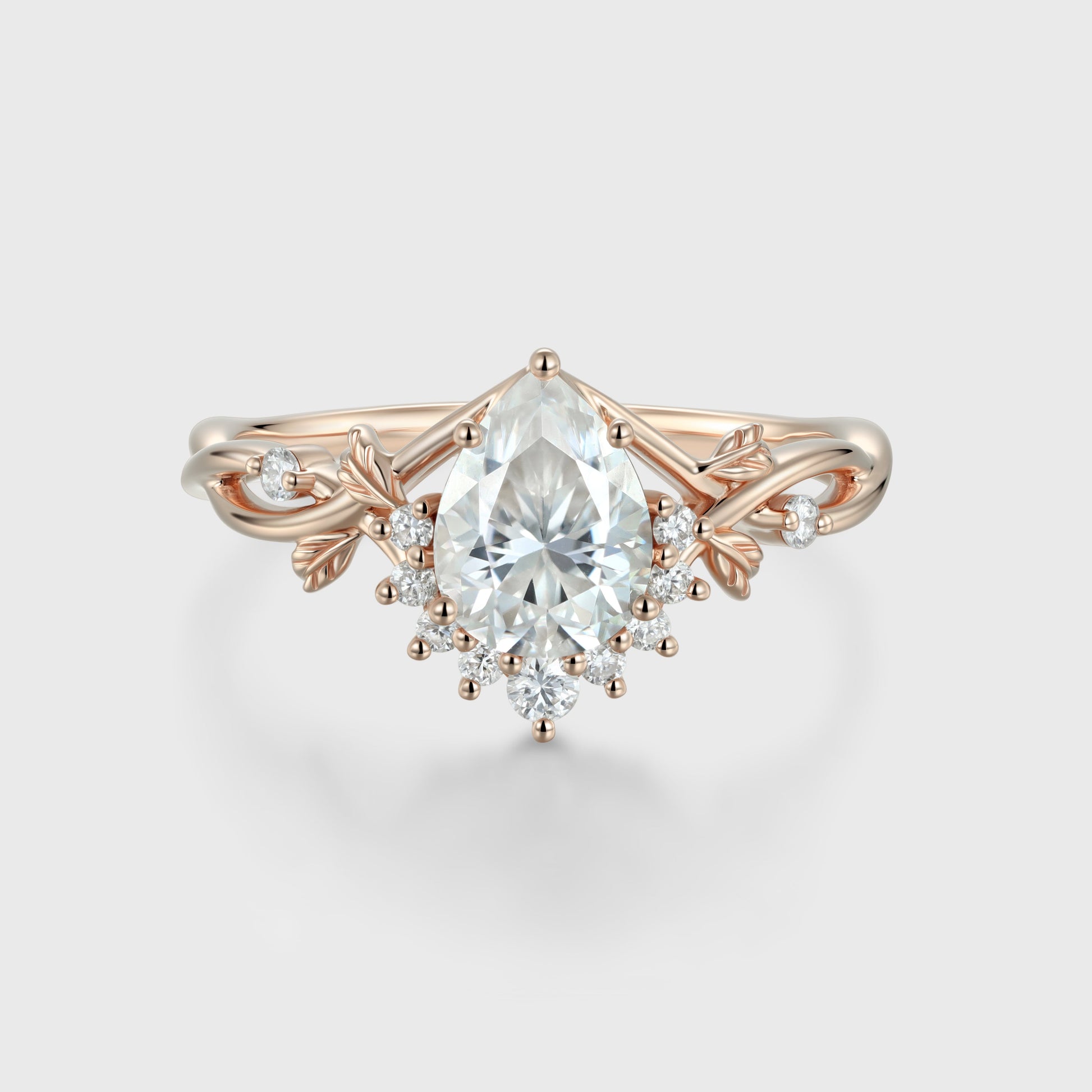 Nature Inspired Pear cut Moissanite Leaf Gold Engagement Ring