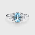 Oval cut Aquamarine Cluster Engagement ring