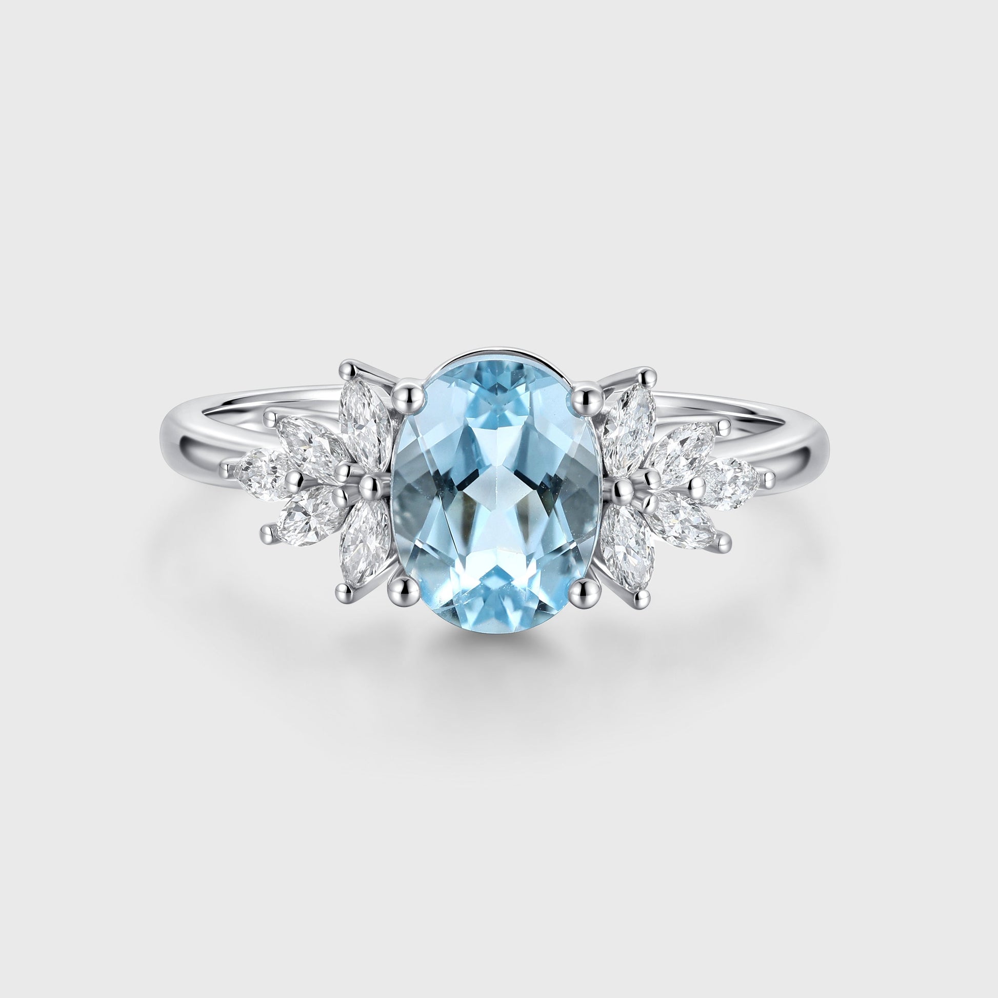 Oval cut Aquamarine Cluster Engagement ring