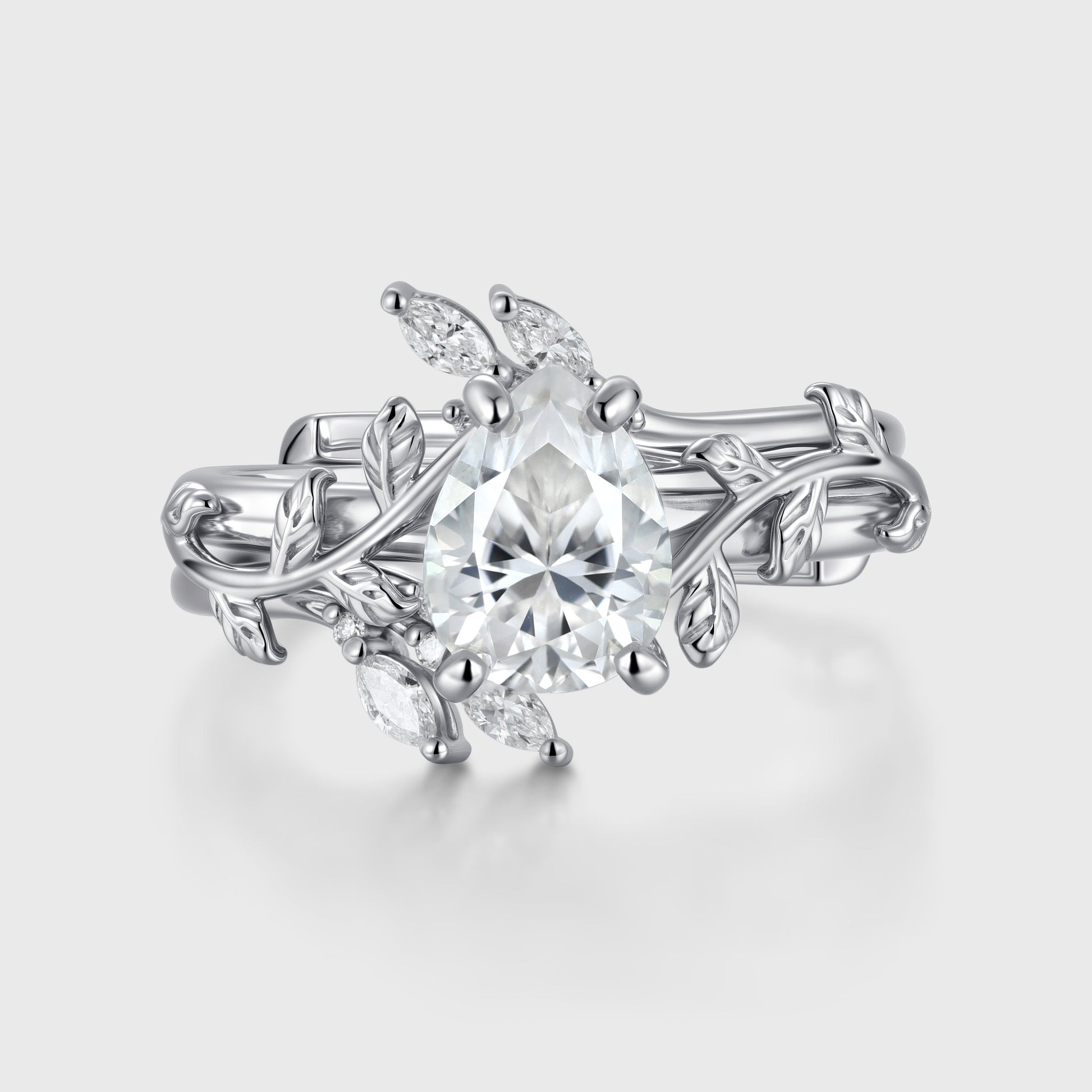 Nature Inspired Pear cut Moissanite Leaf Gold ring set