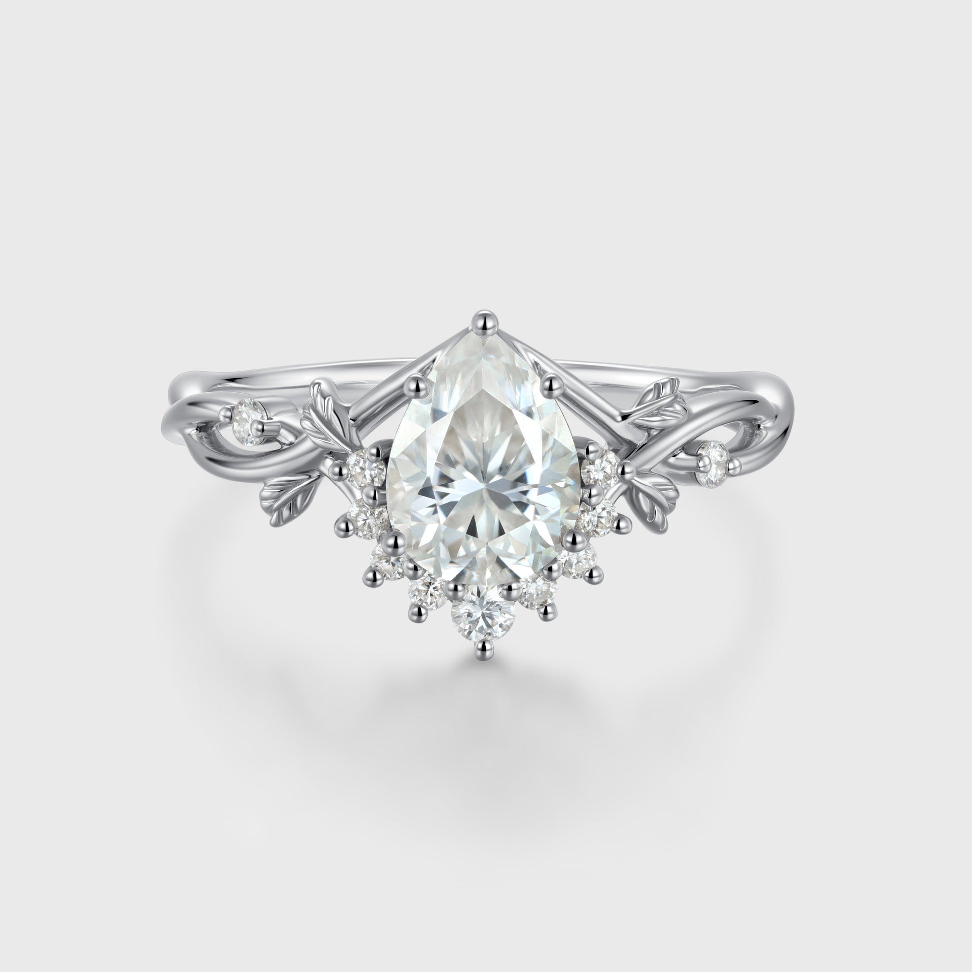 Nature Inspired Pear cut Moissanite Leaf Gold Engagement Ring