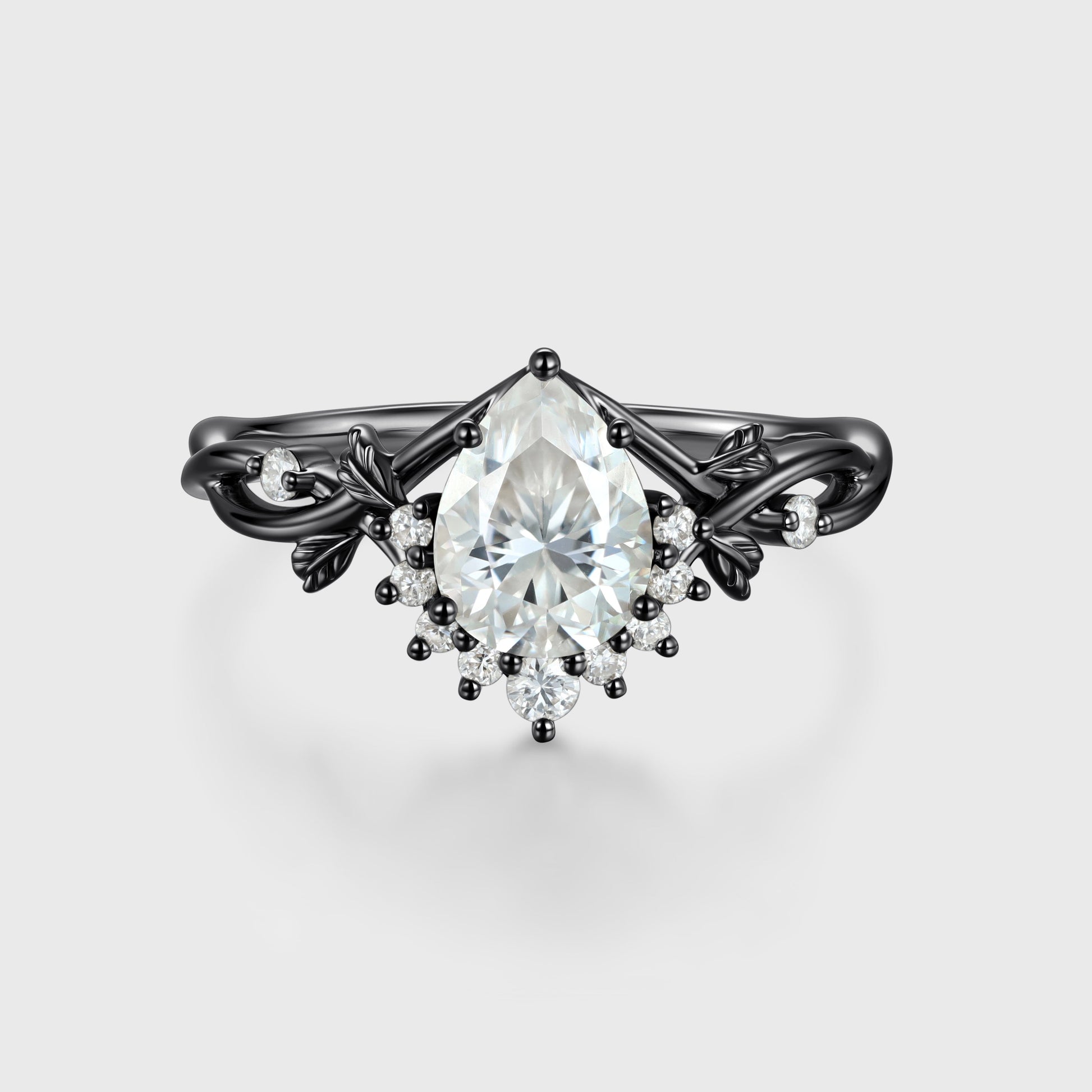 Nature Inspired Pear cut Moissanite Leaf Gold Engagement Ring