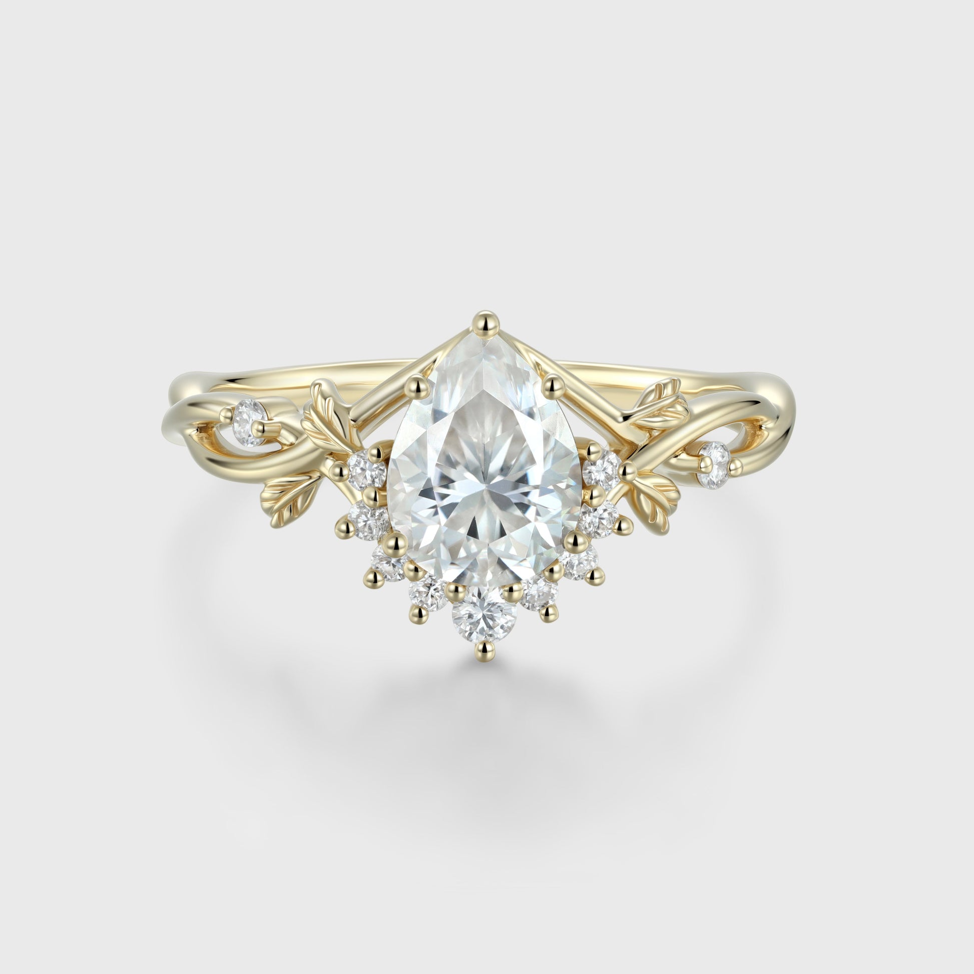 Nature Inspired Pear cut Moissanite Leaf Gold Engagement Ring