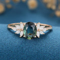 Oval Blue-Green Sapphire Cluster Engagement ring