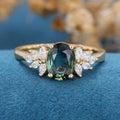 Oval Blue-Green Sapphire Cluster Engagement ring