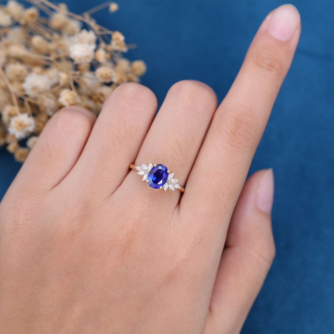 Oval cut Sapphire Cluster Engagement ring