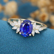Oval cut Sapphire Cluster Engagement ring 
