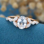 Oval cut White sapphire Cluster Engagement ring 