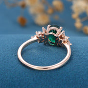 Oval cut Emerald Cluster Engagement ring 
