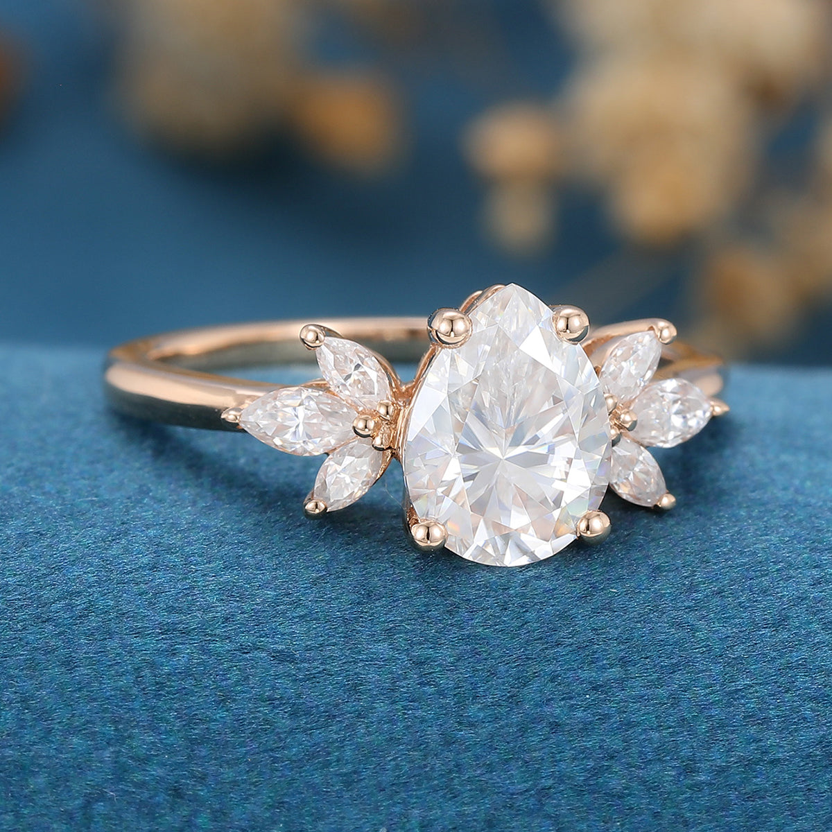 1.25 Carat Pear cut Moissanite Cluster Engagement ring 