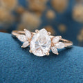 1.25 Carat Pear cut Moissanite Cluster Engagement ring 
