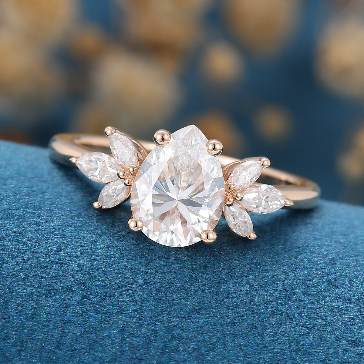1.25 Carat Pear cut Moissanite Cluster Engagement ring 