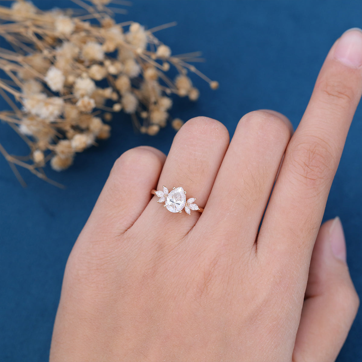 1.25 Carat Pear cut Moissanite Cluster Engagement ring 