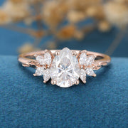 Pear cut Moissanite Cluster Engagement ring 